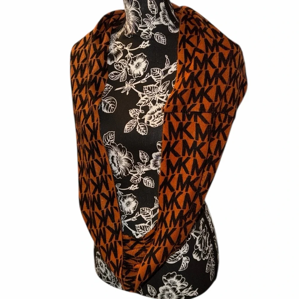 Michael Kors monogrammed, orange and black infinity scarf